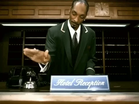 Snoop dog on the reception hitting a bell